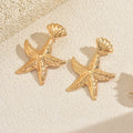 Wholesale gold earrings - european & american style irregular starfish earrings for women - beach vacation pleated texture statement studs