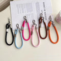 Adjustable polyester wrist lanyard - durable anti-loss phone strap with short chain, sturdy double buckle, and clip for outdoor use