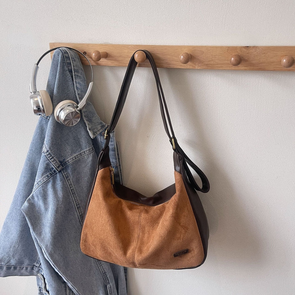 Korean style minimalist suede shoulder bag for women, new autumn 2025 collection, large capacity, fashionable niche design, commuter crossbody bag