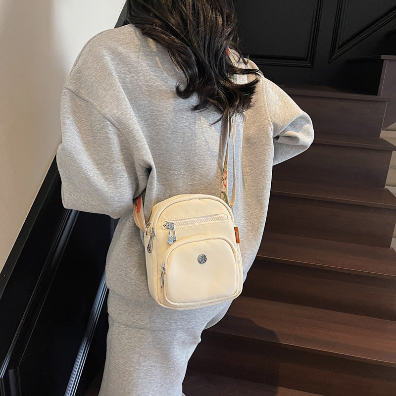 Foreign trade lightweight small cloth bag women's 2025 new summer fashion lightweight small satchel mobile phone bag multi-layer messenger bag