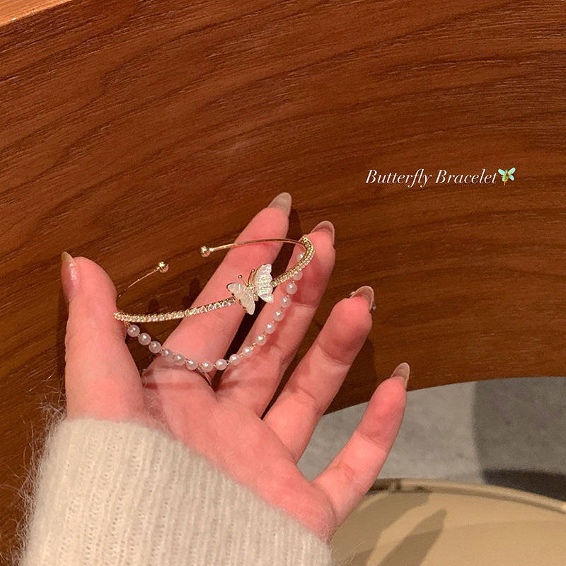 Open double-layer butterfly bangle with high-end pearl chain - women's autumn niche design jewelry, light luxury and unique bracelet