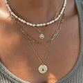 European and american chic minimalist faux pearl necklace - vintage french style, light luxury, diamond-accented smiley face & devil's eye layered necklace
