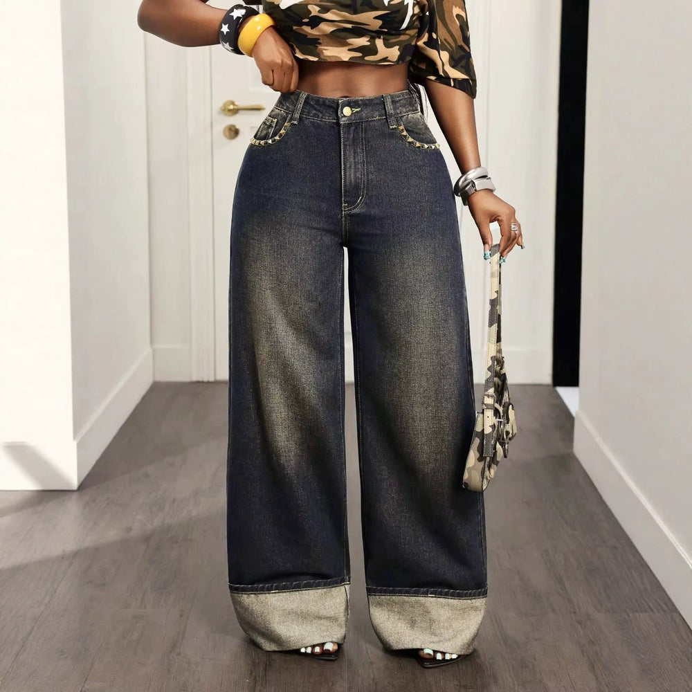 European and american style women's high-waisted vintage distressed washed denim jeans with pocket studs, patchwork, rolled hems, and wide leg, floor-length trousers