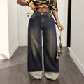 European and american style women's high-waisted vintage distressed washed denim jeans with pocket studs, patchwork, rolled hems, and wide leg, floor-length trousers