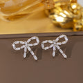Er-14 silver bow earrings