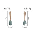 Green wooden handle fork and spoon