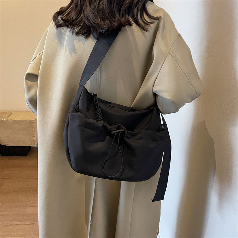 Cross-border special supply of solid color Oxford cloth messenger bag casual cloth bag 2024 new drawstring wide shoulder strap shoulder bag