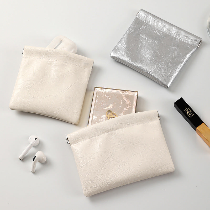 New retro shrapnel automatic tight mouth storage bag simple mini earphone bag small mouth red envelope portable change bag