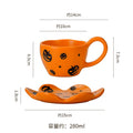 Creative halloween-themed ceramic cup and saucer set, featuring an irregular design with pumpkin and bat motifs. perfect for coffee or tea