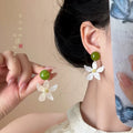 White summer green flower earrings for women niche stylesense of design forest styleeasiest for match earrings show face small holiday style earrings