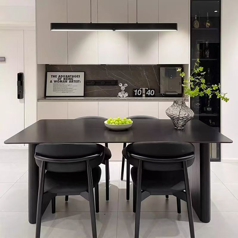 Modern minimalist sintered stone dining table with black dining chairs set - premium small apartment italian-style rectangular dining table for home and b&b