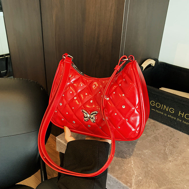 Foreign style simple rhombus single shoulder armpit bag women 2025 new high-end niche diamond-encrusted messenger bag wholesale