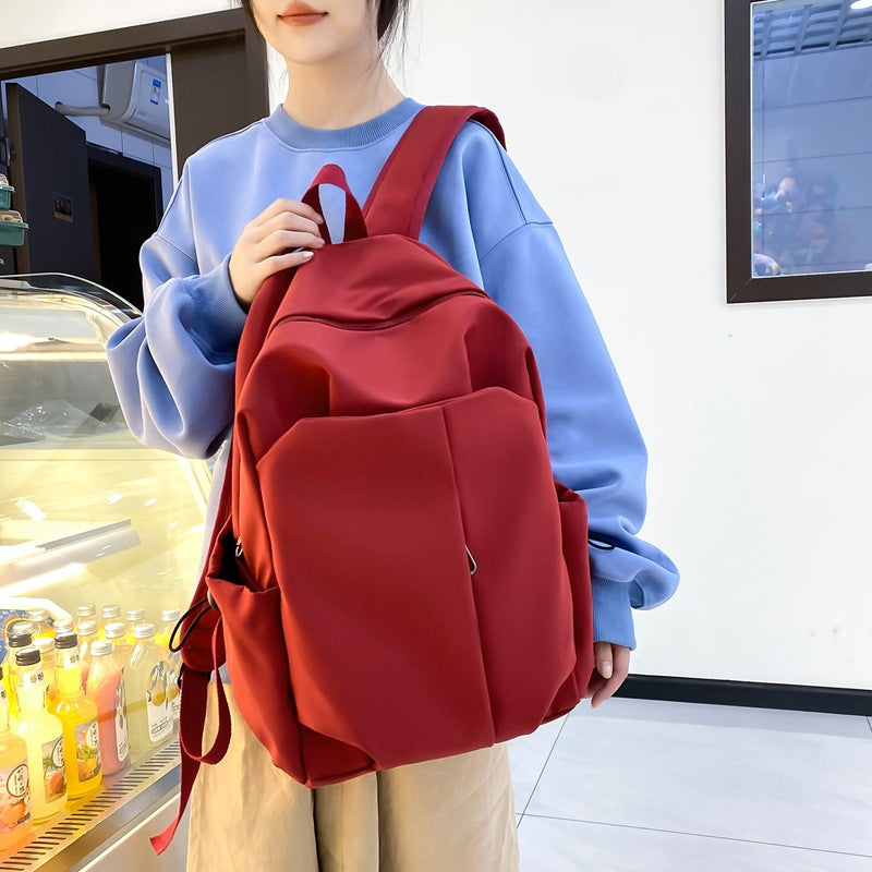 New fashion versatile student composite cloth Korean version trendy fashion boys and girls casual backpack  wholesale