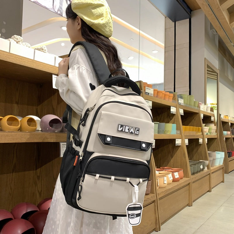 New large-capacity schoolbag male junior high school students contrasting color double backpack Korean version college student couple fashion backpack
