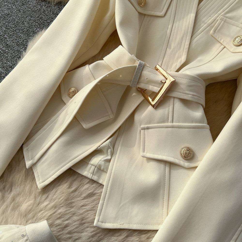 Elegant and chic chanel-inspired two-piece set: women's autumn outfit featuring a tie-waist cardigan and mesh skirt