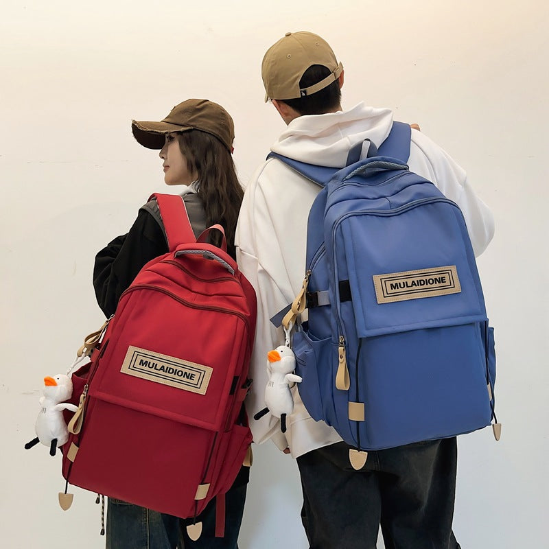 New large-capacity backpack, male and female college students with the same schoolbag, junior high school high school students travel business computer backpack