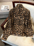 Luxury leopard print blouse with tie-waist, stand collar, and lantern sleeves - elegant workwear for women, 1688 source