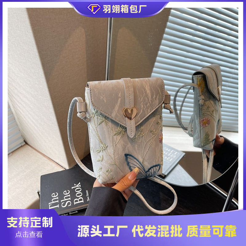 Cross-border embroidered canvas bag women's summer 2025 new fashion niche messenger bag Korean version Internet celebrity popular mobile phone bag