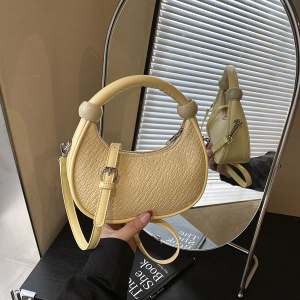 Niche temperament portable small bag women 2025 summer new trend fashion shoulder bag foreign style messenger dumpling bag