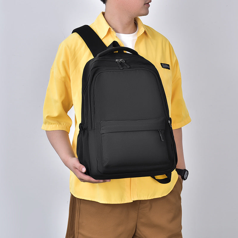 New fashion middle school women's schoolbag casual simple trend versatile backpack campus couple Oxford cloth men