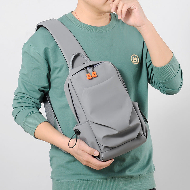 Factory new wholesale men's breast bag, water-proof and wear-resistant shoulder bag, simple and fashionable commuter messenger bag can be printed.