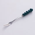 Dark green fork