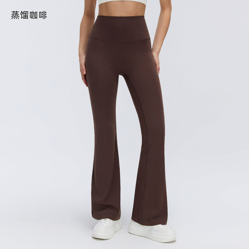 High-waisted, slightly flared yoga pants for women, designed to lift the hips, flatten the tummy, and create a slimming silhouette. these stretchy, barely-there feel leggings are perfect for pilates and other fitness activities. style d26017