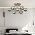 Nordic light luxury magic bean molecular silver electroplated semi-transparent round glass living room chandelier - modern minimalist