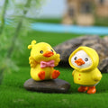 Car ornament little yellow duck resin ornament cartoon cute mini doll diy gardening micro landscape crafts