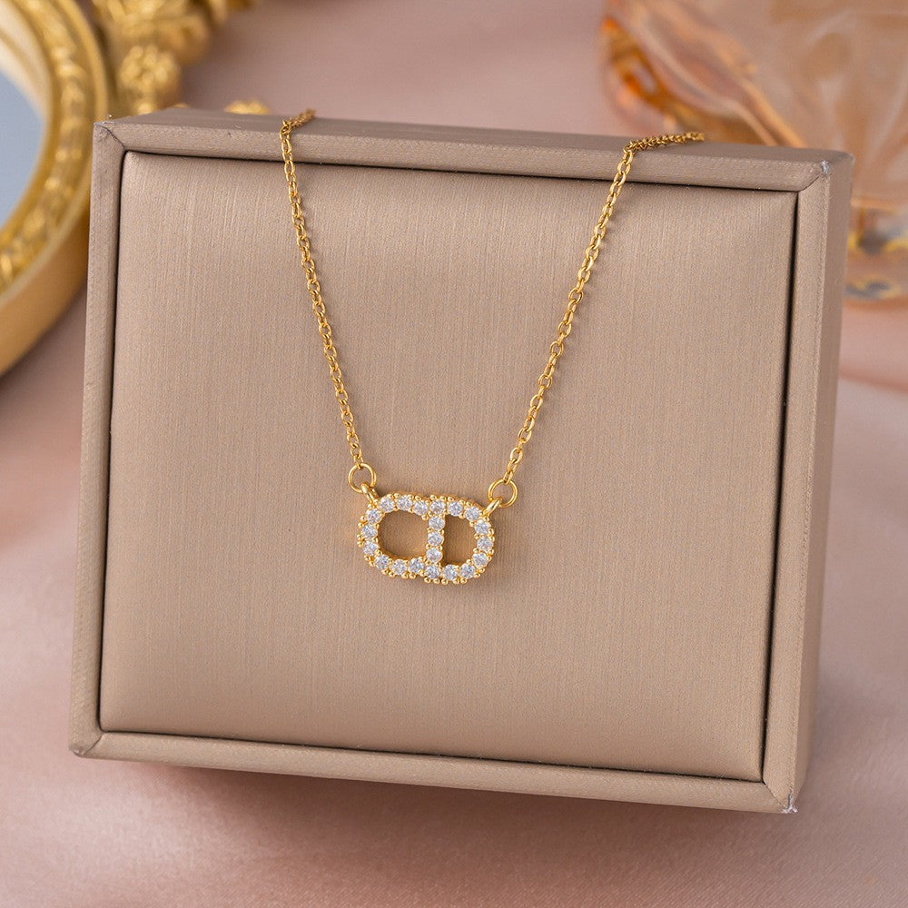 Copper inlaid zirconium four-leaf clover necklace for women, titanium steel real gold plating popularinsfashion flower exquisite sweater chain jewelry