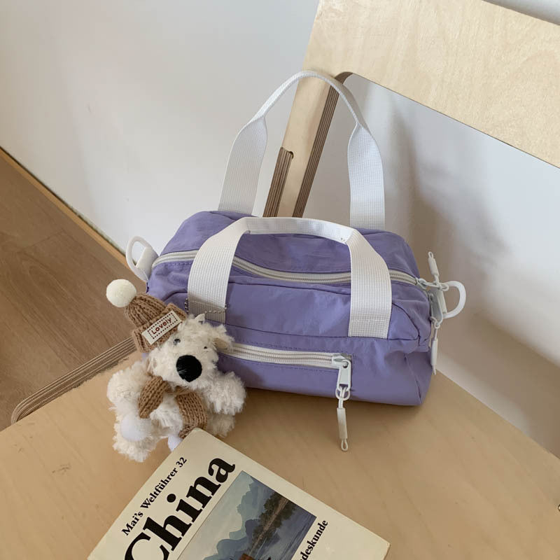 Foreign trade Japanese light casual nylon cloth portable small bag women's 2025 new shoulder messenger bag bowling bag