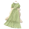 French-inspired pleated, waist-cinching, slimming dress for women. red, tie-waist, elegant, and flowy maxi dress, perfect for the office