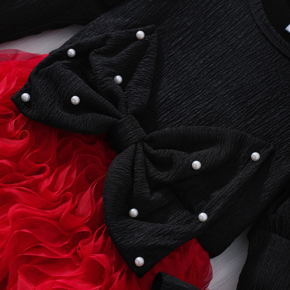 Girls' dress for toddlers and young children, featuring a large bow, pearl embellishments, and a 3d wavy tulle skirt