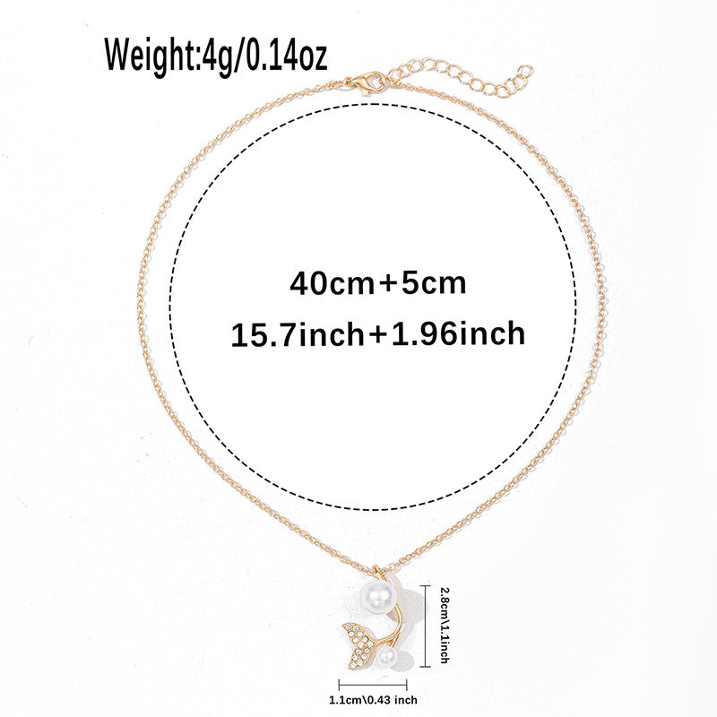 European and american cross-border e-commerce new jewelry: autumn/winter fashion pearl cross pendant versatile diamond-encrusted fishtail necklace for women