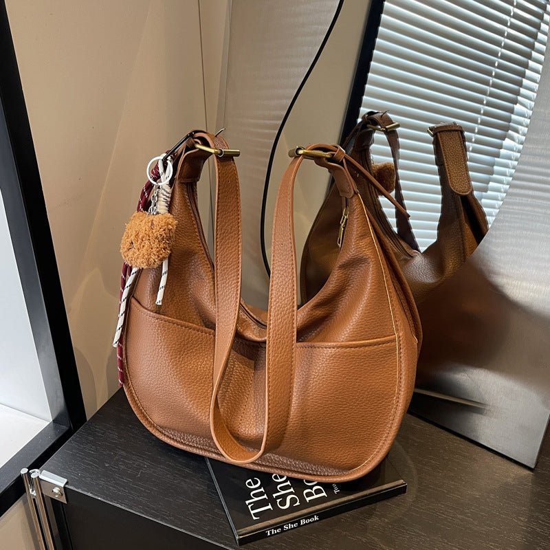 Autumn Internet celebrity explosion 2025 Korean version of the new fashion Mori dumpling bag simple and versatile casual messenger shoulder bag