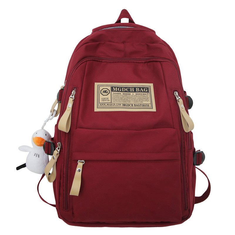 Spring and summer simple travel backpack computer backpack casual solid color ultra-light junior high school students large-capacity schoolbag