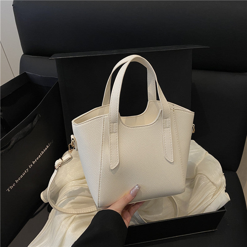Simple and versatile portable bucket bag women's Korean version ins fashionable and simple shoulder bag 2025 new casual messenger bag