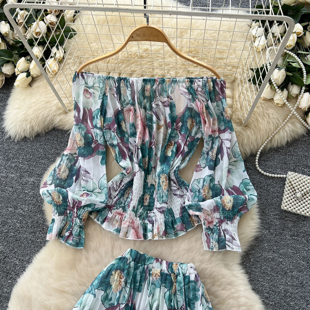 French style women's autumn outfit set: chic off-the-shoulder lantern sleeve floral top with high-waisted pleated midi skirt
