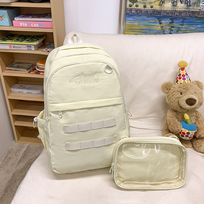 Solid color detachable badge personalized korean style high school student backpack large capacity minimalist versatile college student backpack