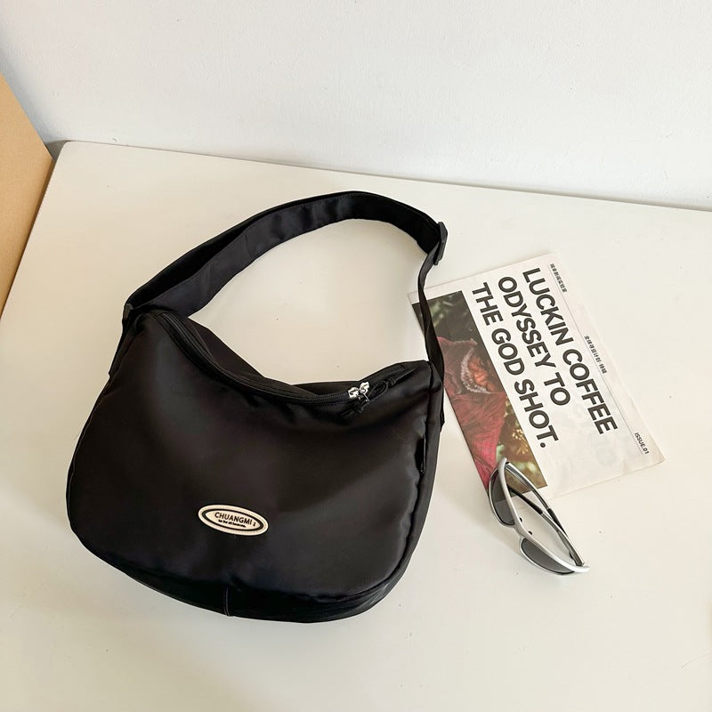 Foreign single nylon cloth bag women's large capacity 2025 new summer versatile shoulder messenger bag casual commuter dumpling bag