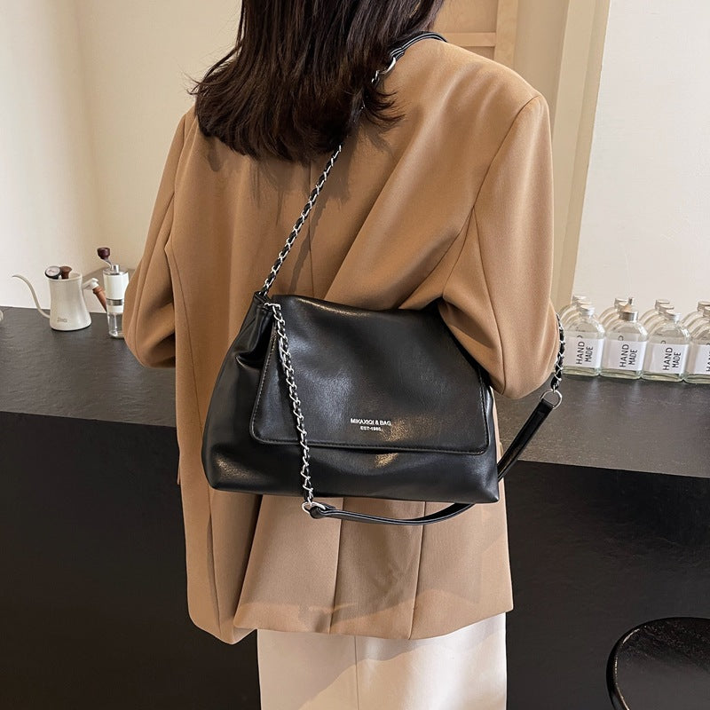 Solid color simple large-capacity foreign gas bag women's 2025 new trendy underarm commuter chain single shoulder tote bag
