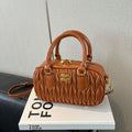 Niche pleated mini pillow bag 2025 new shoulder fashion crossbody bag autumn and winter retro handheld bowling bag