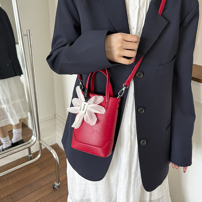 Cross-border high-end niche bag women's 2025 summer new exquisite flower mobile phone bag portable shoulder messenger bag