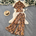 Leopard print vacation-ready two-piece set: summer chic, high-waisted wide-leg pants, effortlessly stylish and youthful