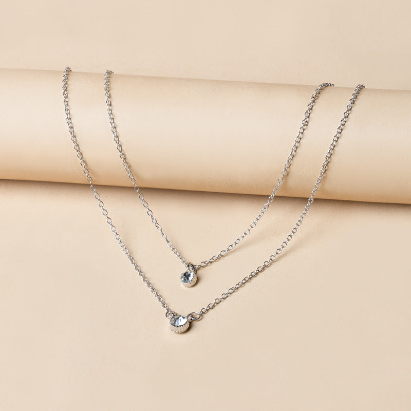 Stacked necklace wholesale european and american cross-border autumn and winter jewelry women's creative simple electroplated small round diamond circle sweater chain