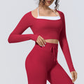 Naked-feel, form-fitting, quick-dry yoga top. faux two-piece design with built-in bra pads. long-sleeved athletic top for pilates, training, and fitness. women's