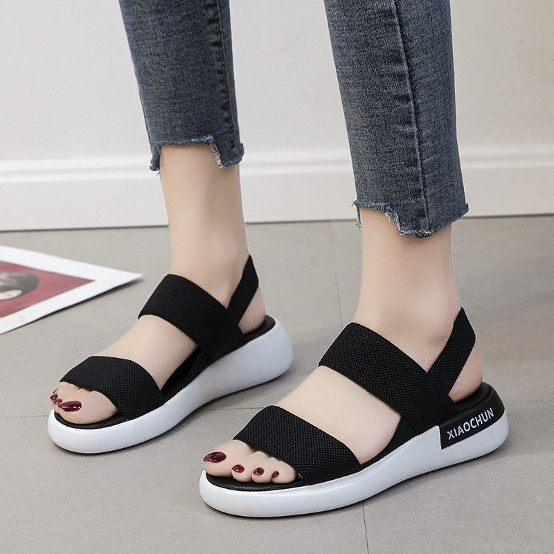 Sports sandals women's elastic elastic 2021 summer new student flat-bottomed outer wear fairy style Roman beach women's shoes