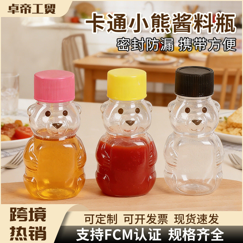 hot seller: bear-shaped clear pp plastic bottles with lids - perfect for juice, drinks, sauces, and honey. airtight sealing