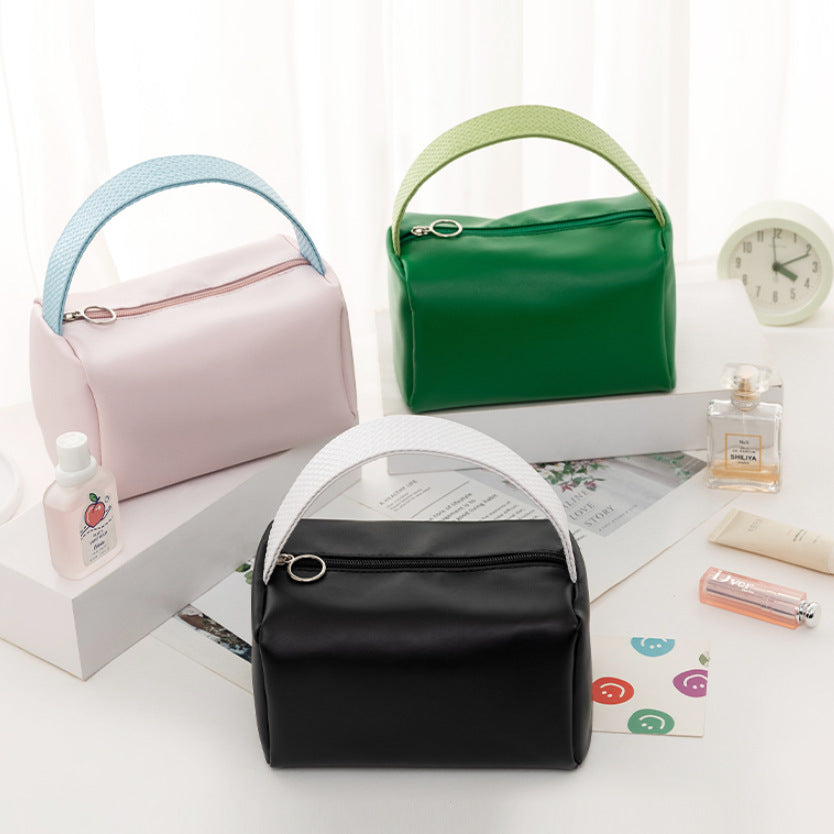 Portable cosmetic bag, new candy color, large-capacity storage bag, finishing bag, cosmetics, portable toilet bag, wholesale.