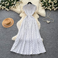 Vintage red short-sleeve polka dot dress - a versatile summer staple: high-waisted a-line, work-ready, slimming maxi dress